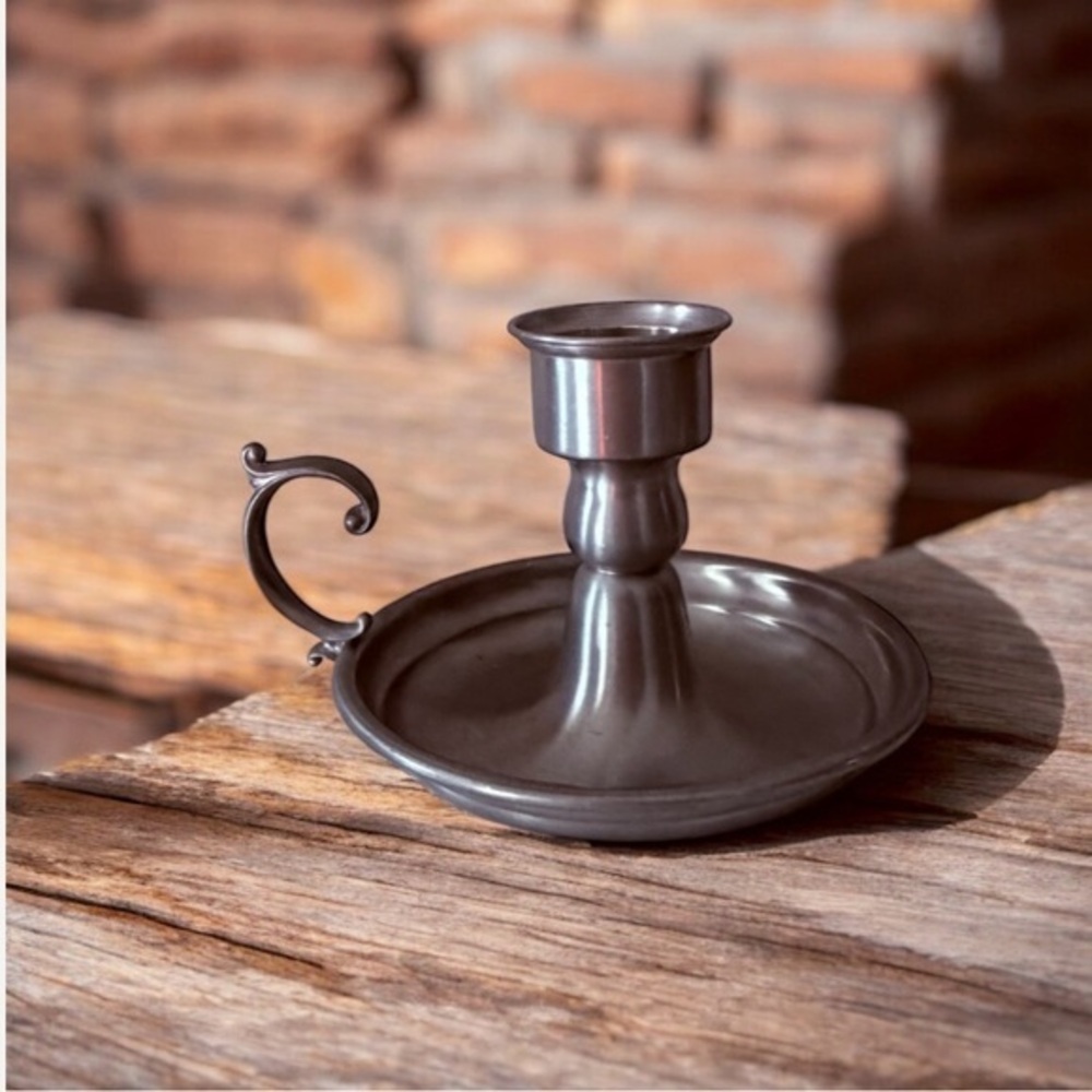 an Early American Pewter by Web chamberstick candle holder